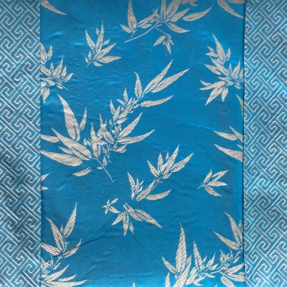 NEW Table Runner Aqua Blue with gold shimmery designs.